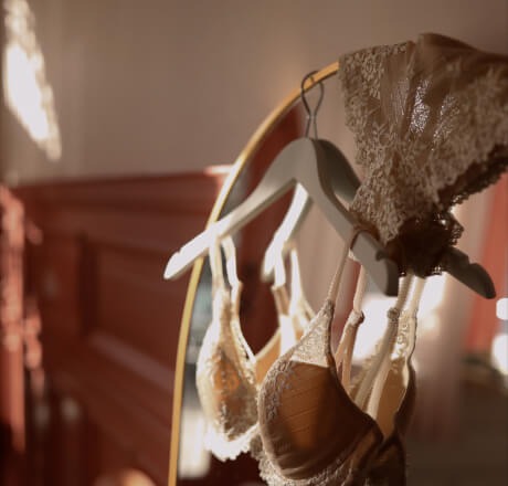 underwear handing over a mirror