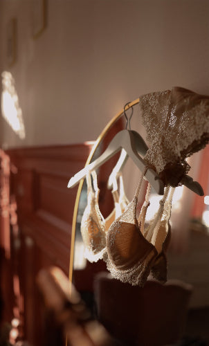 Bra hanging up next to matching briefs